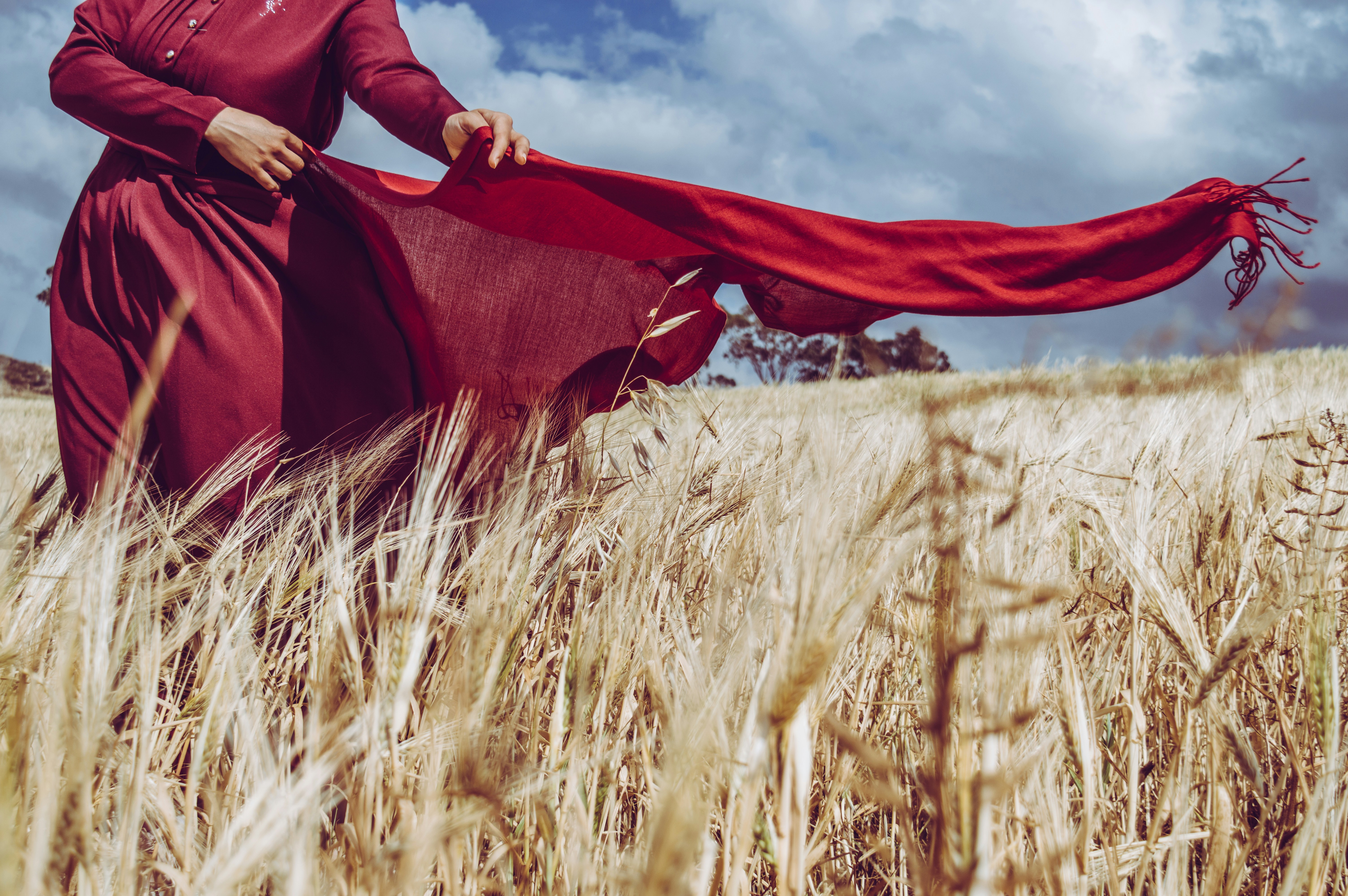 Woman wears red dress photo Free Brown Image on Unsplash