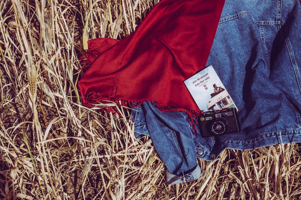 camera on blue denim jacket