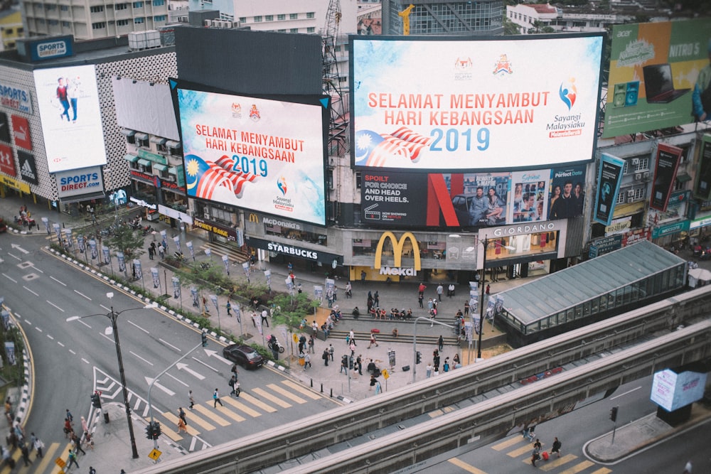 aerial view of building with billboard displays 2019 Selamat Menyambut Hari Kebangsaan