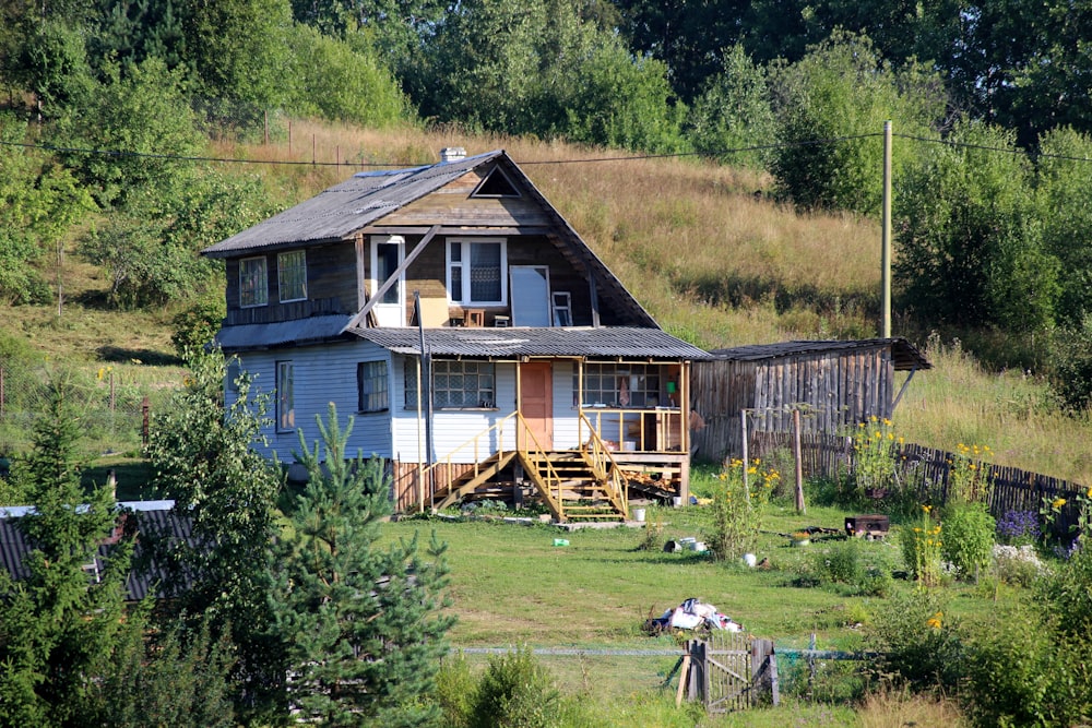 white 2-story house during daytime