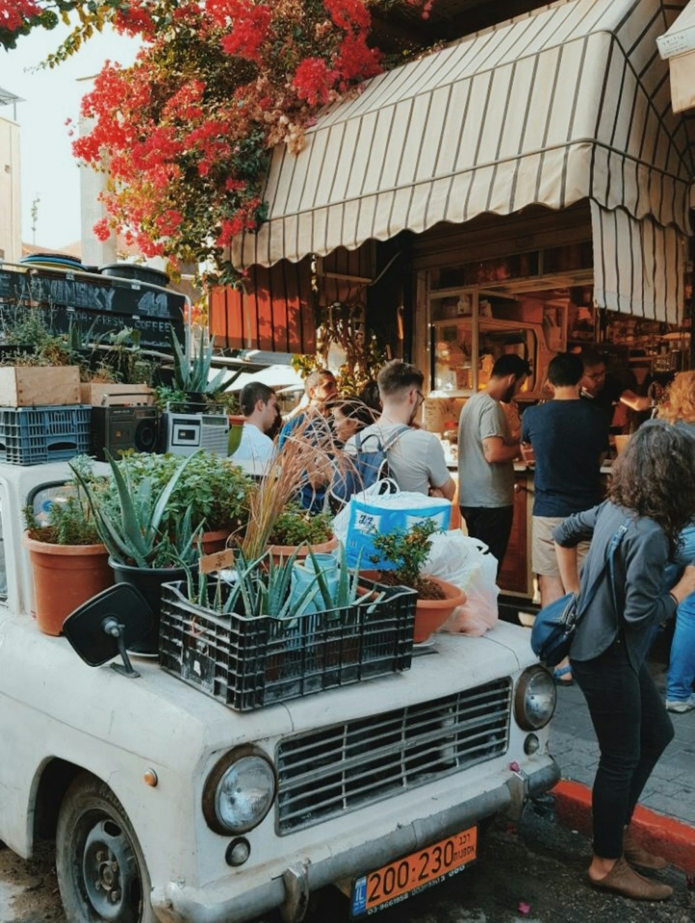 people standing beside store