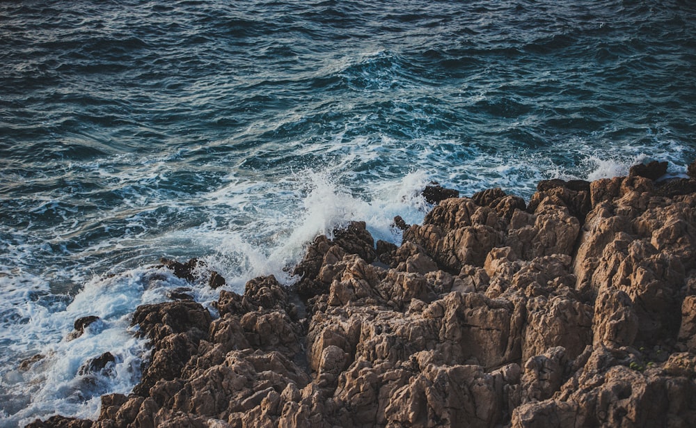 rocks ear ocean