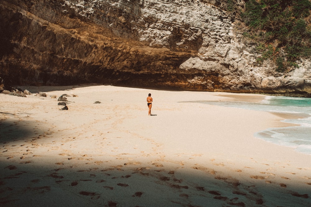 woman standing near ocean