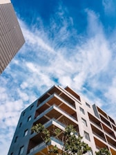 a tall building sitting next to a tall building