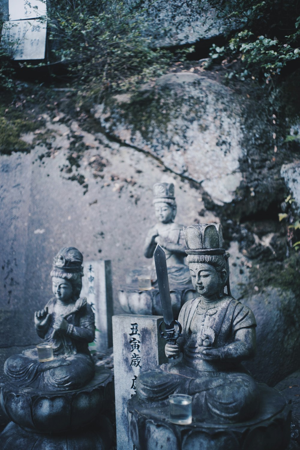 two buddha figures