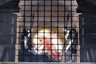 An ethereal depiction of angels and archangels in a celestial setting.