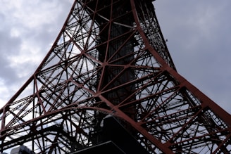 A close-up of a metal structure being assembled on-site.