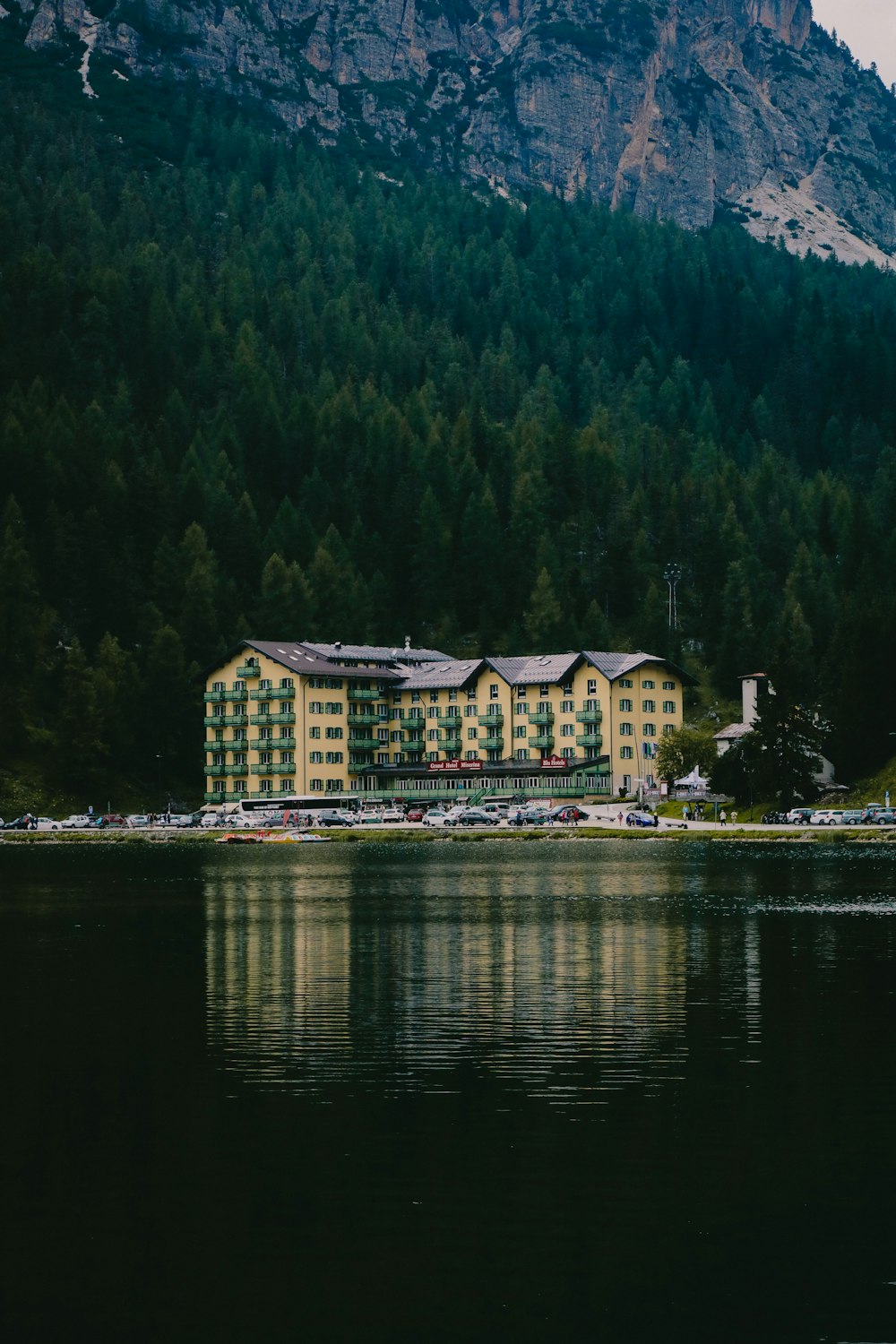 castle near lake and mountain