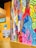 A vibrant wall mural showcasing a dynamic design in a modern office setting.