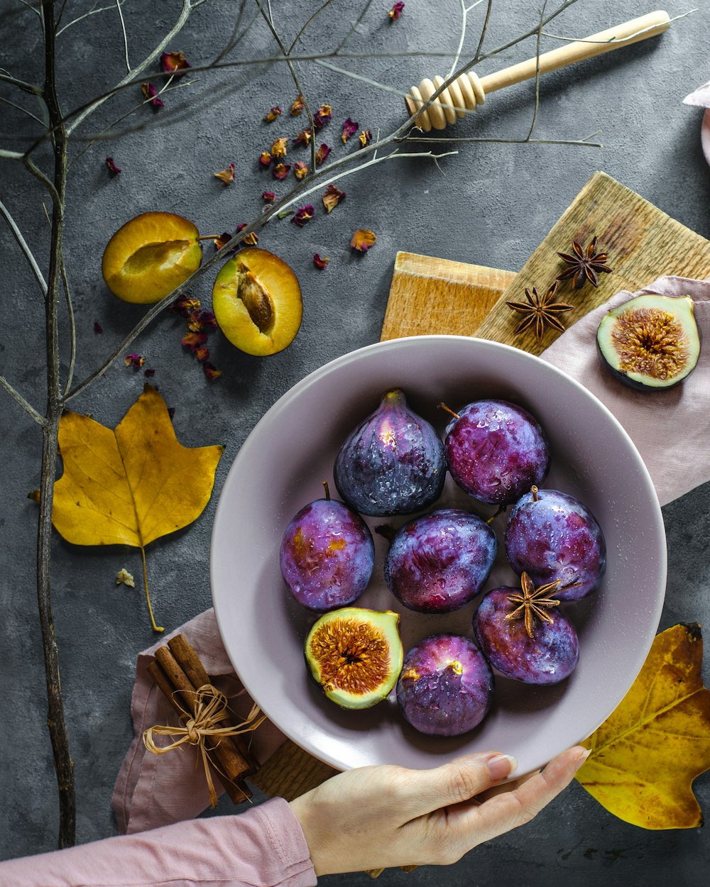 sliced purple fruits in bowl