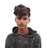 a young man with a messy haircut looks at the camera