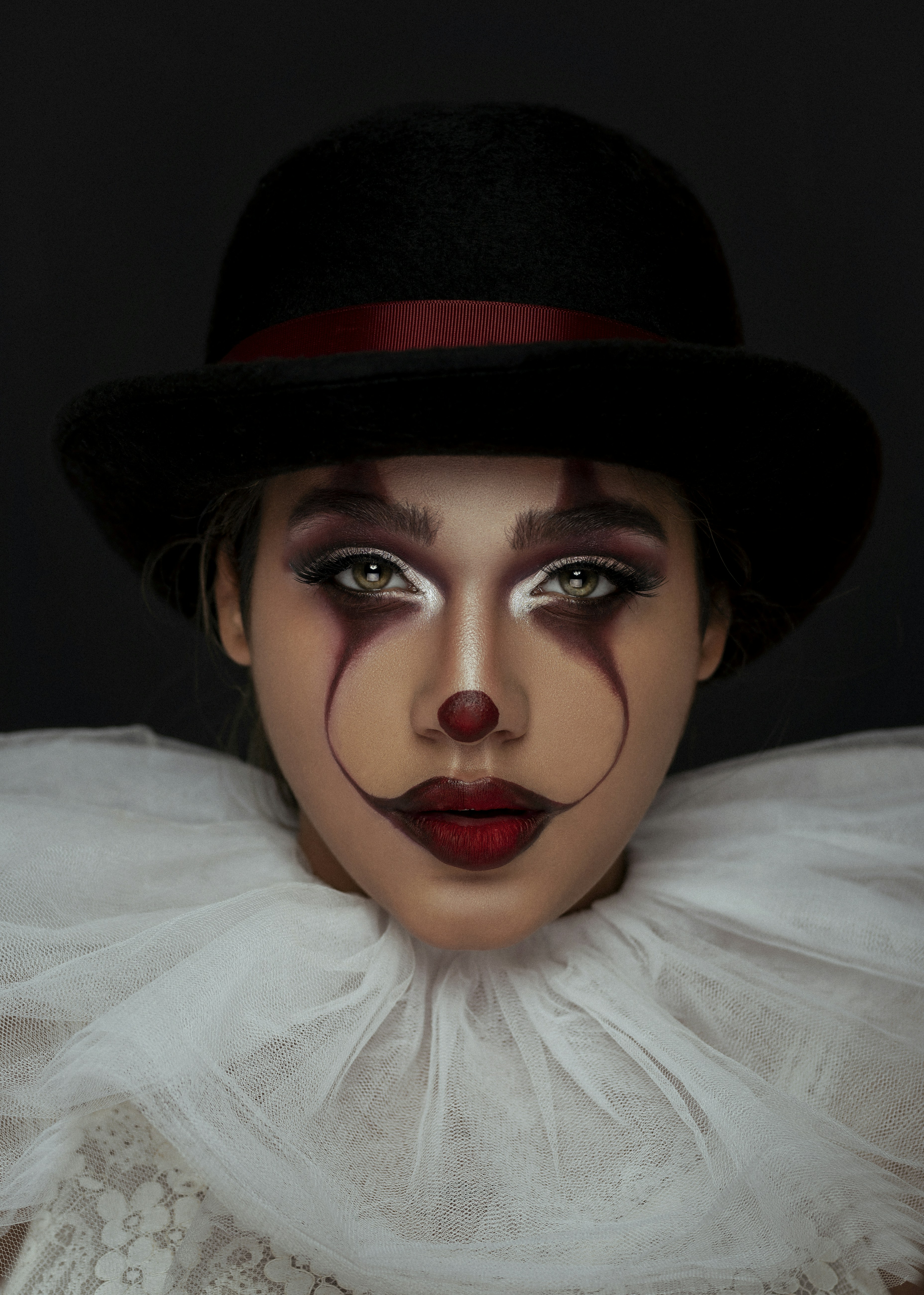 Woman using joker makeup photo – Free Iranian Image on Unsplash