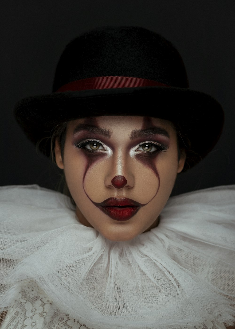 woman using joker makeup