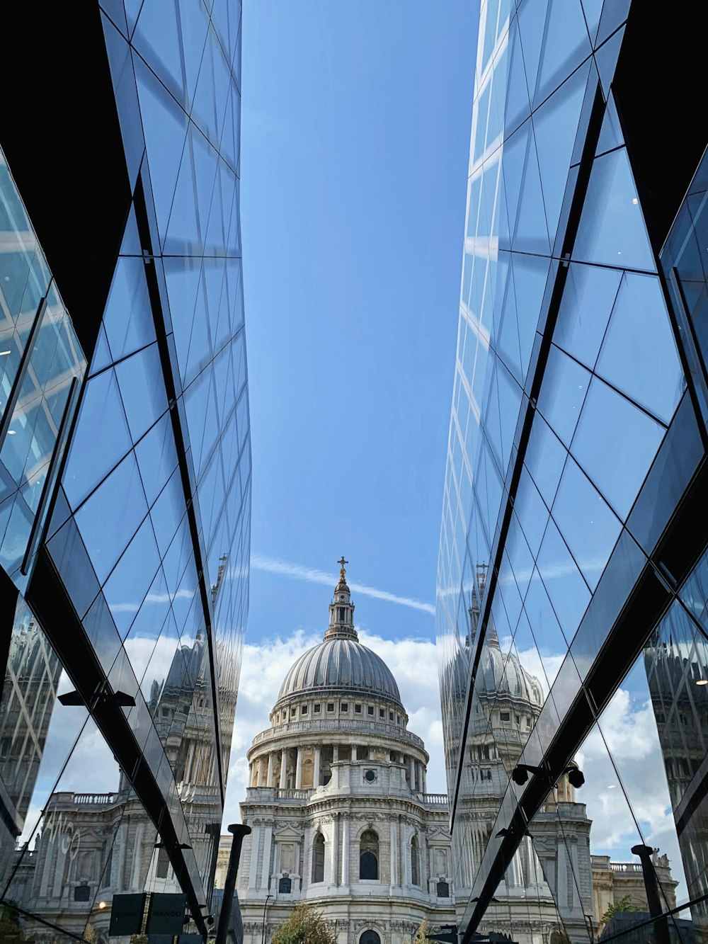 glass buildings near temple during day