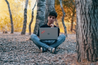 man using Dell laptop