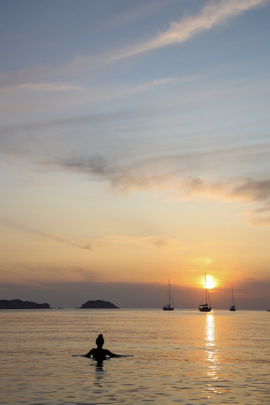 person in sea in Menorca Spain