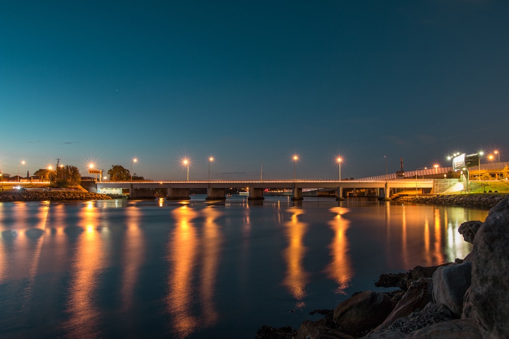 silhouette of concrete bridge during golden hour