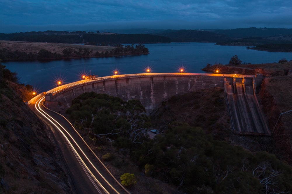 a long exposure shot of a bridge at night