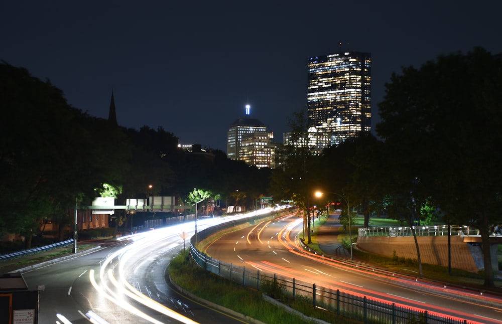 time lapse photography of road during night time