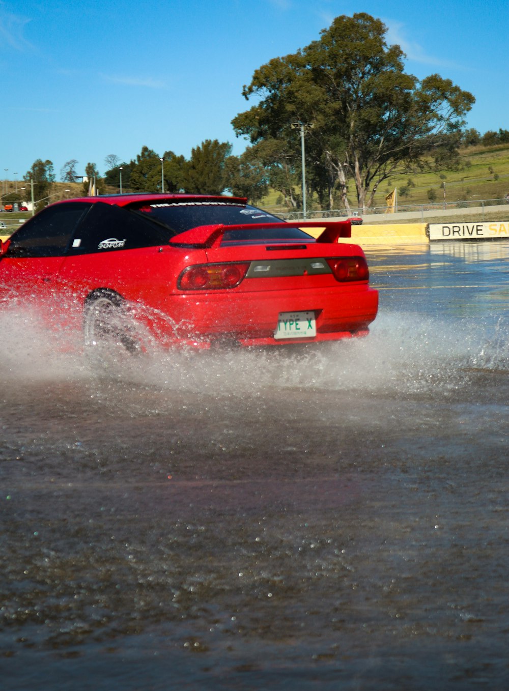 red sports coupe