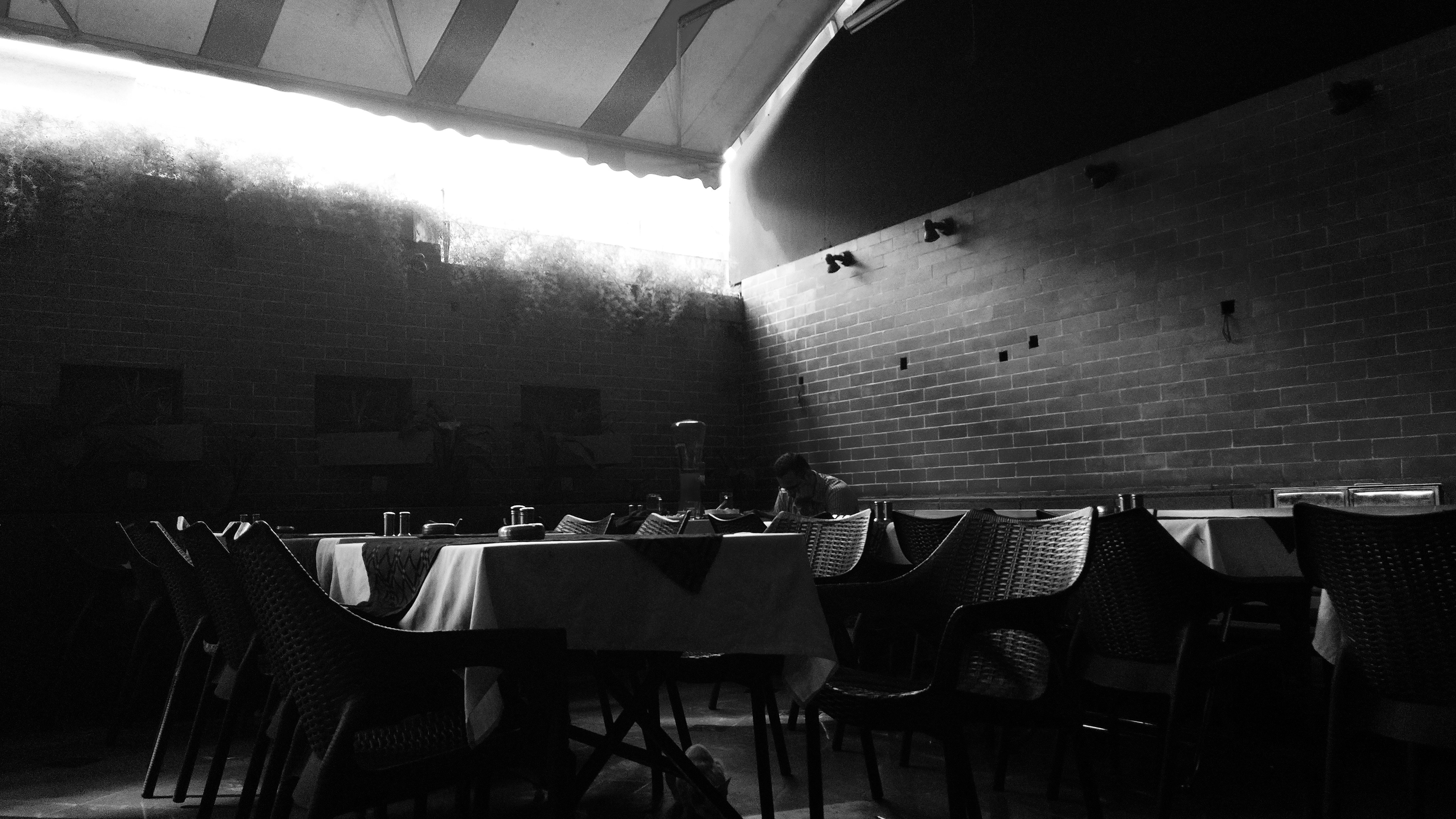 grayscale photo of restaurant
