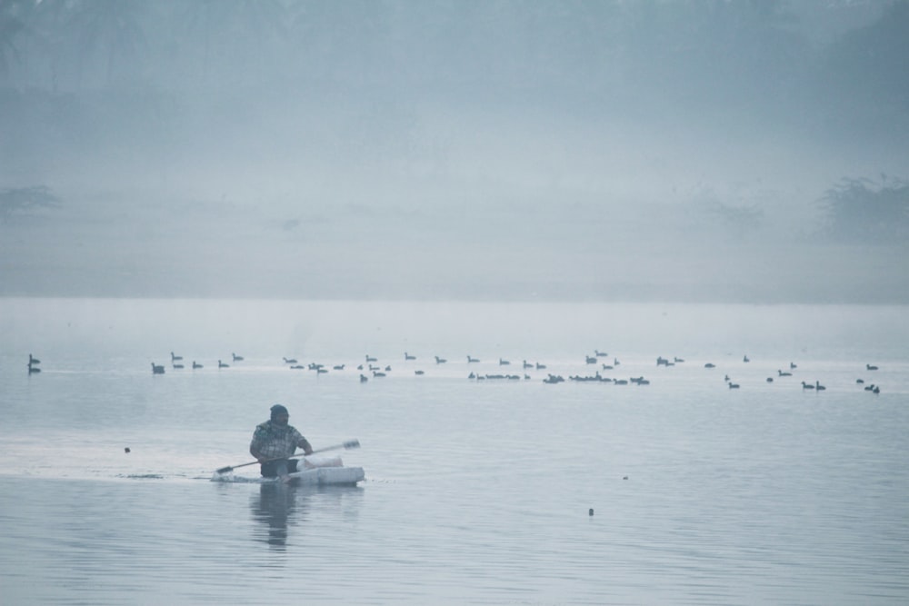 person in boat during daytime