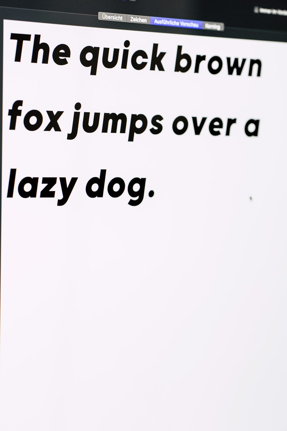 the quick brown fox jumps over a lazy dog text on white background