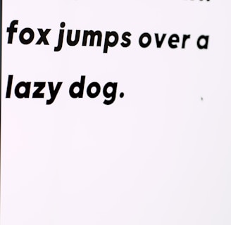 the quick brown fox jumps over a lazy dog text on white background
