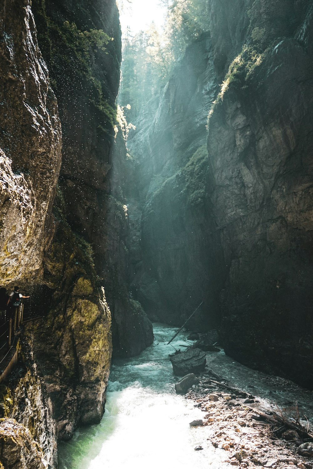 river between mountain during daytime photo