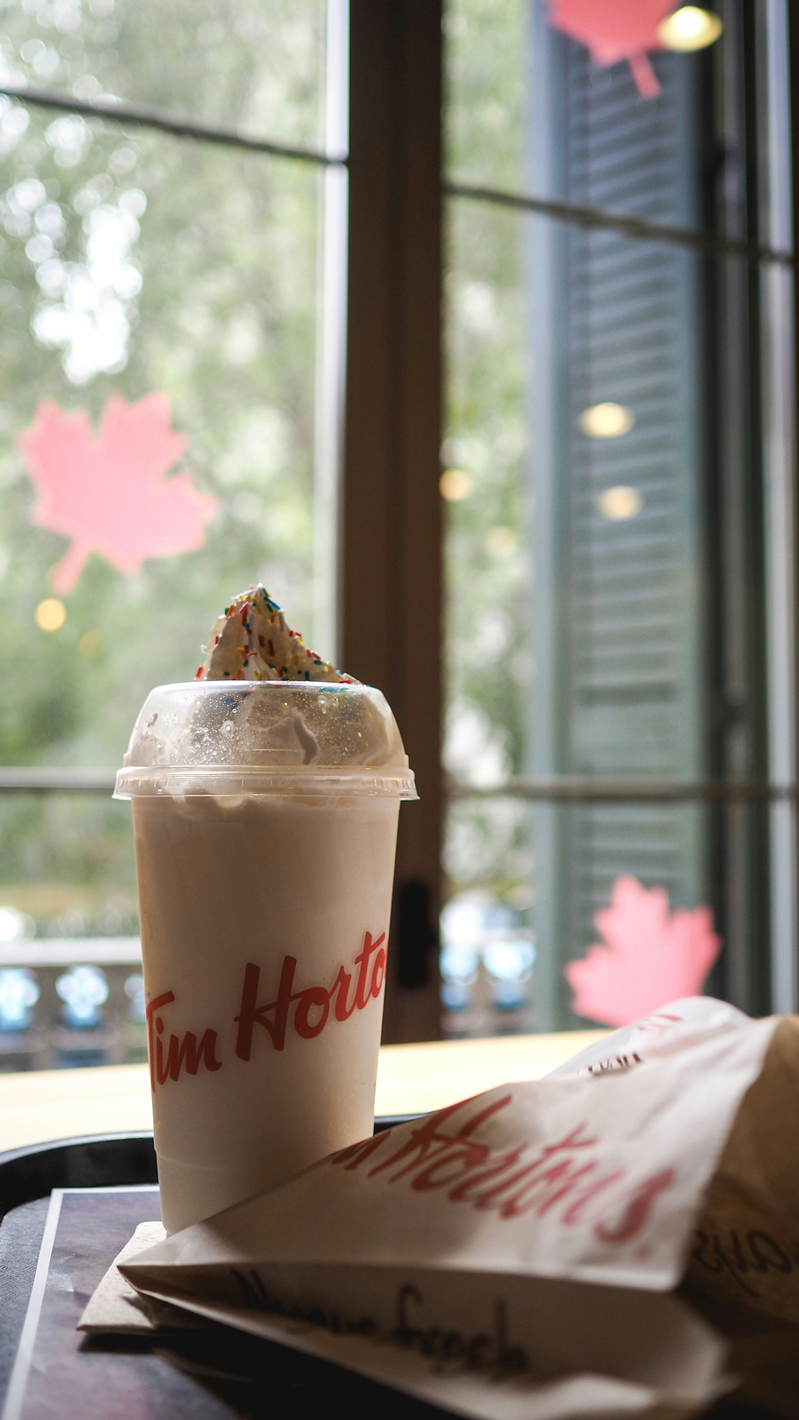 Relaxing with a drink in Tim Hortons, Barcelona summer 2019.