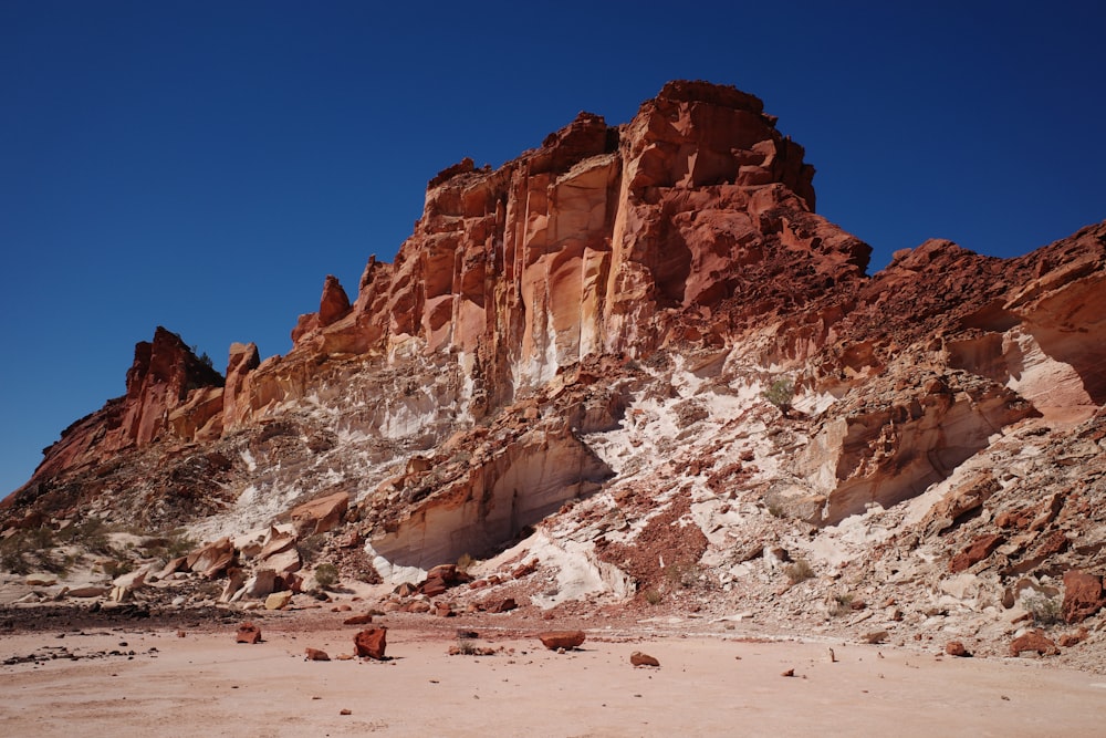 brown mountain under clear blue sky during daytime