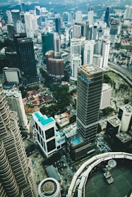 A panoramic view of Kuala Lumpur’s skyline highlighting residential and commercial buildings.