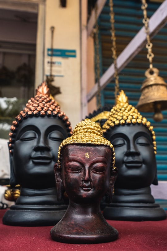 three Buddha head bust in Mahabalipuram India