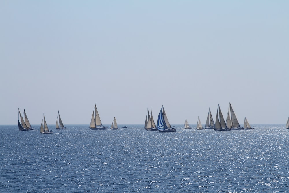 sailboats on sea during daytime