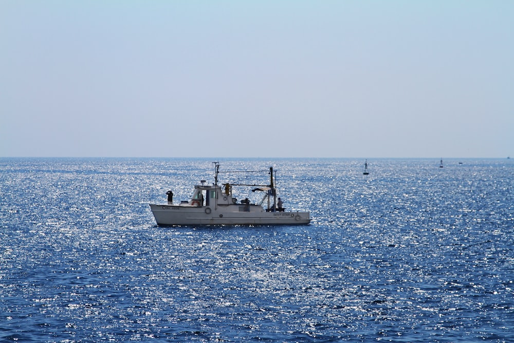 white boat in sea