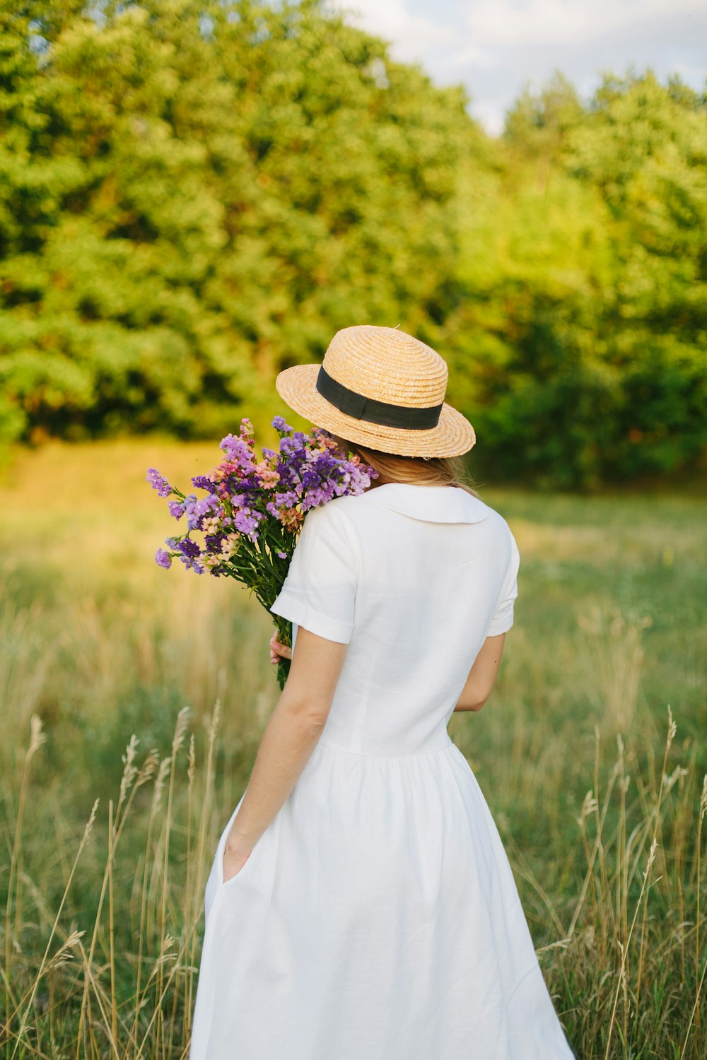 woman holding flowers