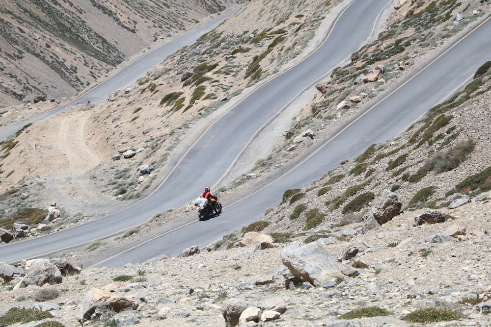 person riding motorcycle during daytime