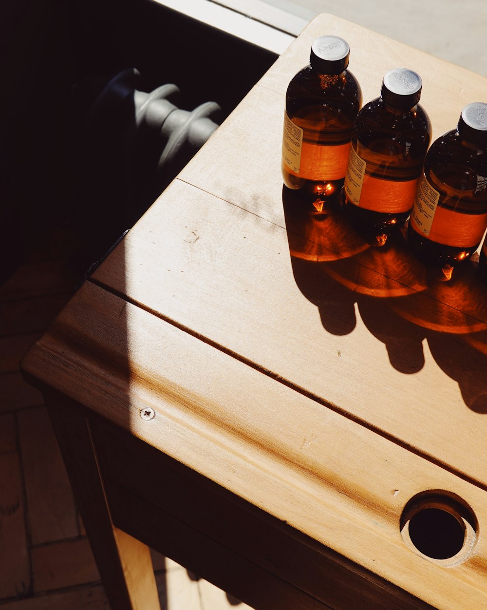 amber glass bottles on tabletop