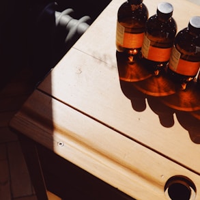 amber glass bottles on tabletop