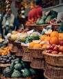 selective focus photography of displayed basket of fruits
