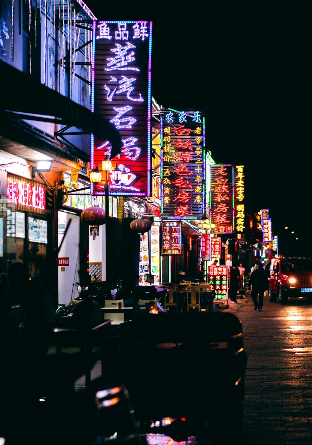 cars on road near stores