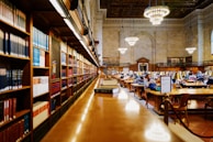 A serene library space with students studying quietly.