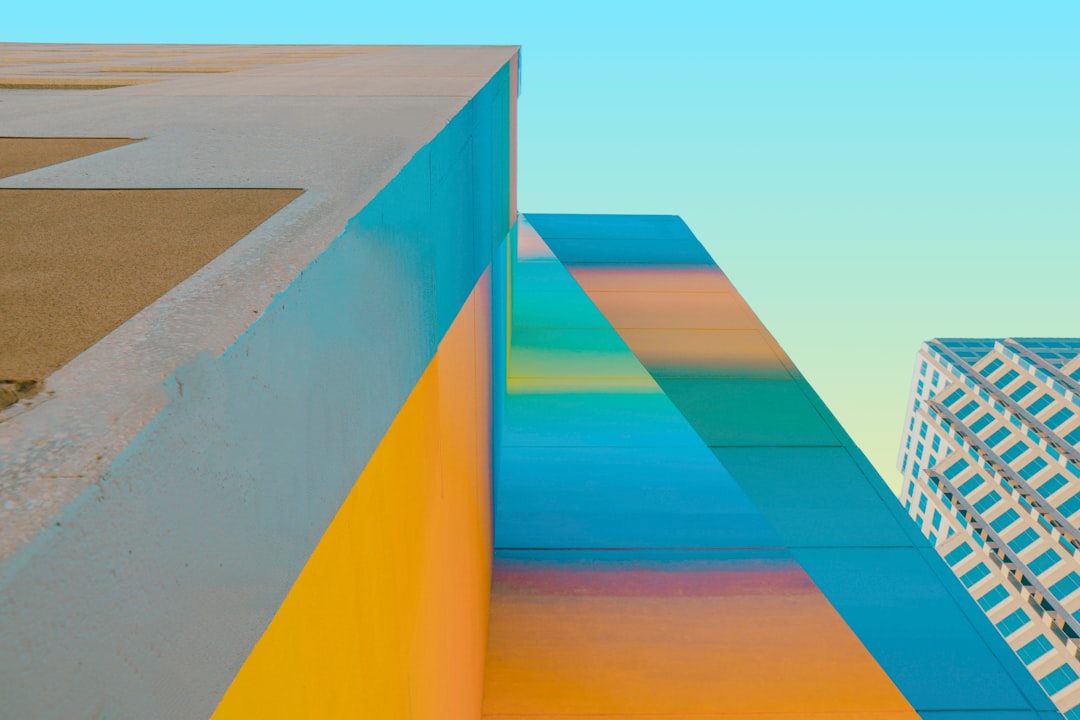 multicolored concrete buildings in low-angle view photo