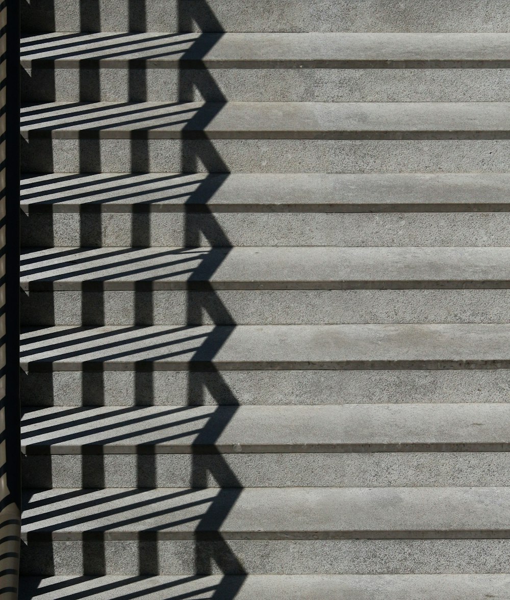 a man riding a skateboard down a set of stairs