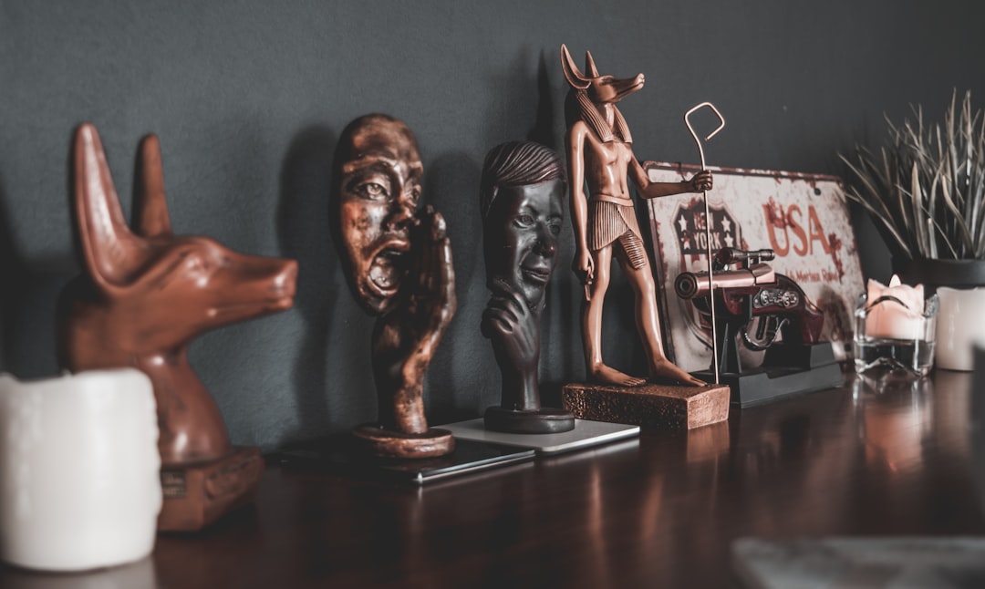 several figurines on wooden surface