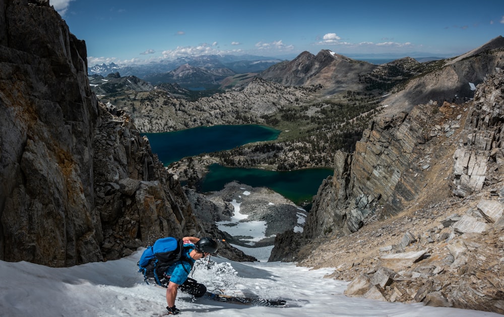 man carrying backpack