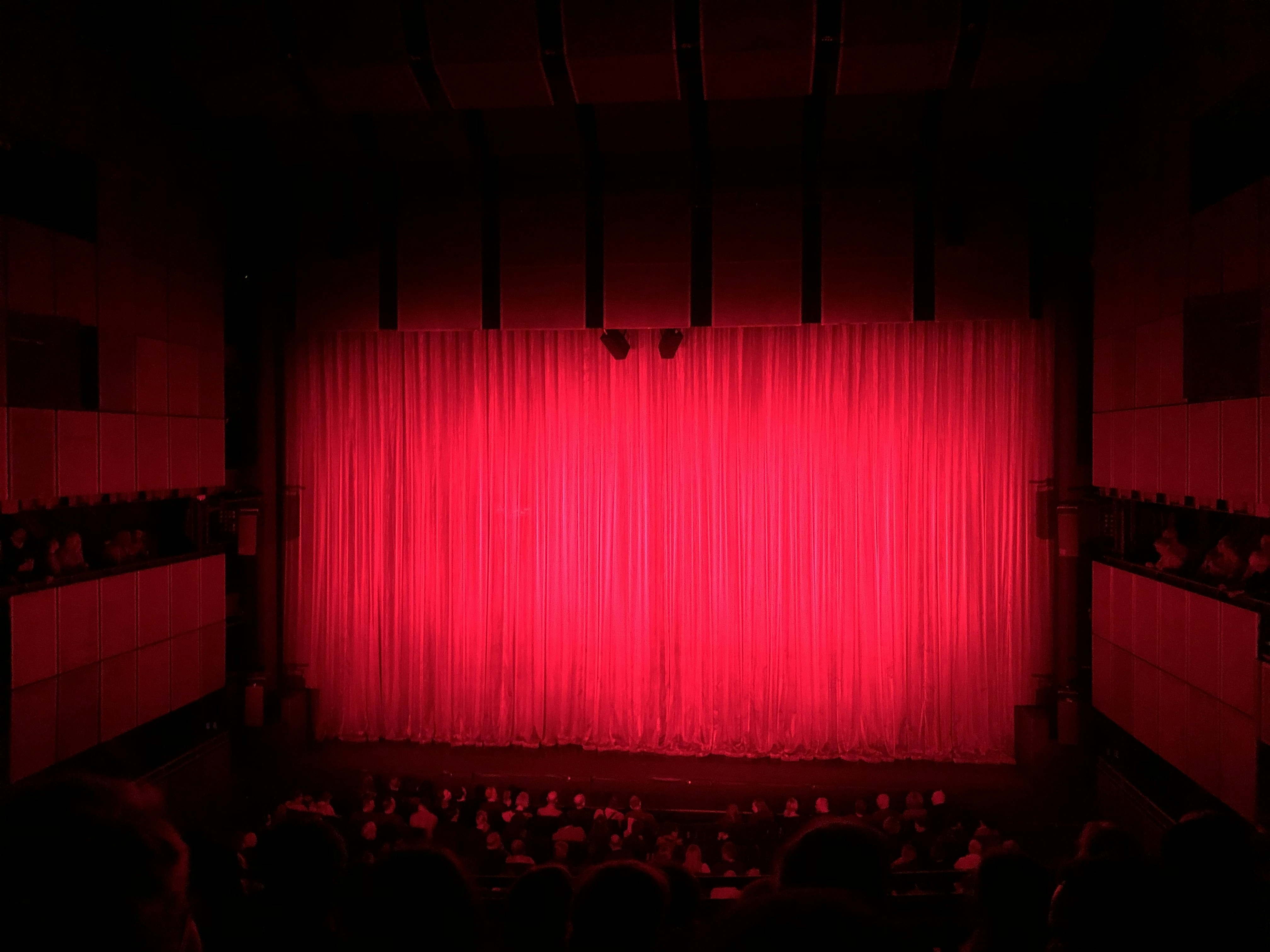 People sitting on theater seat