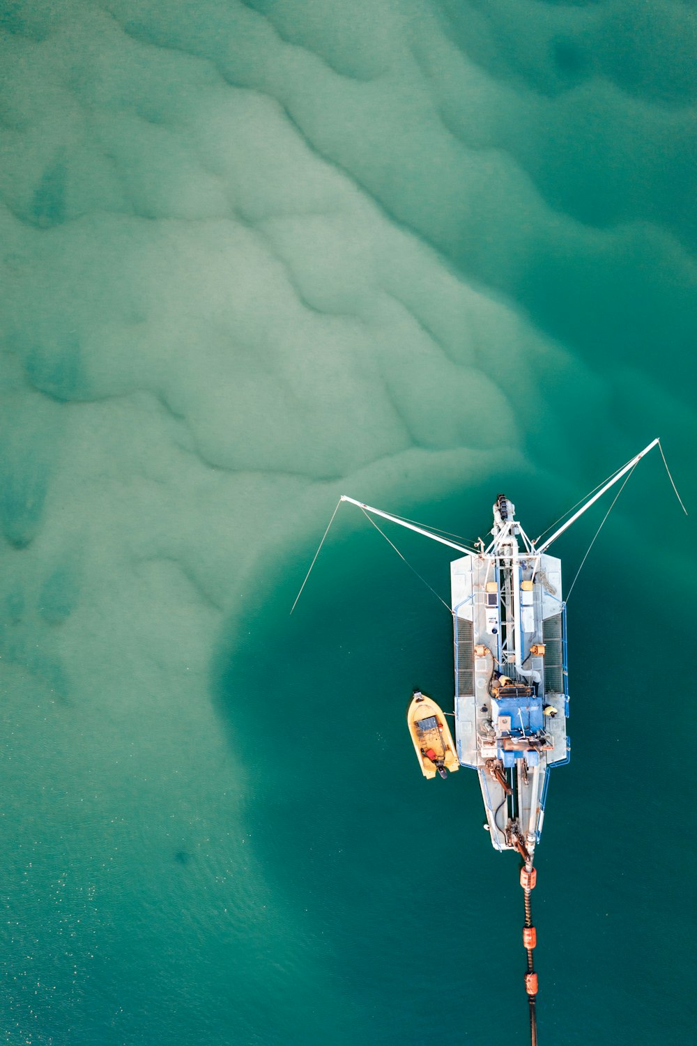 a boat floating on top of a body of water