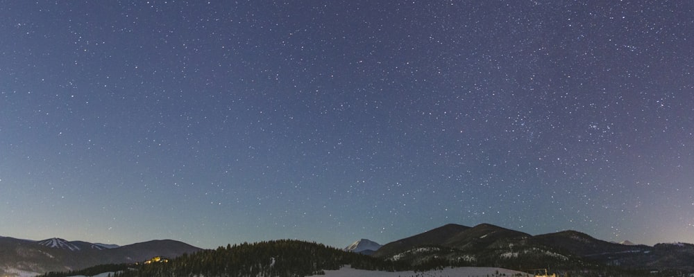 green mountain and stars