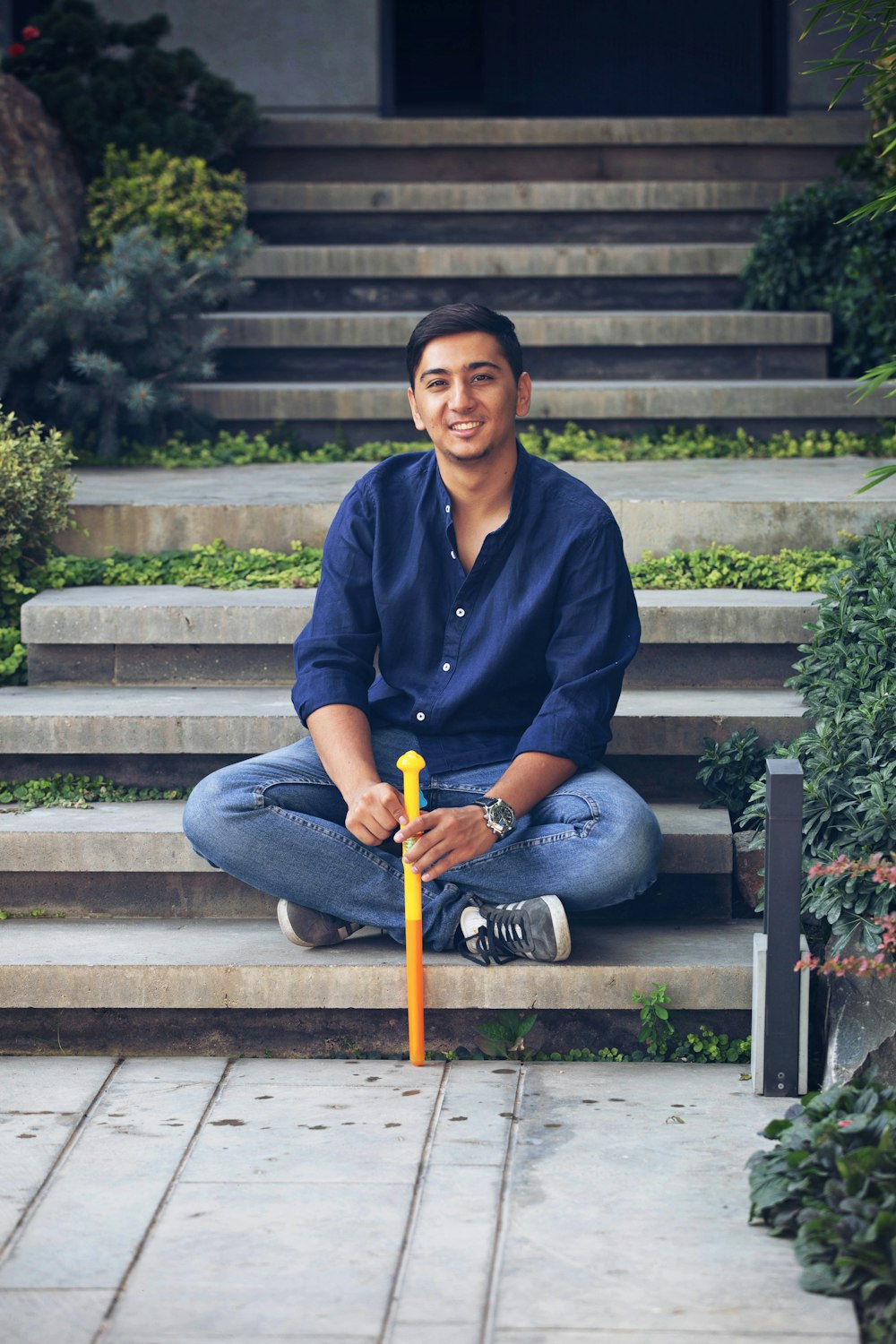 man sitting on stairs